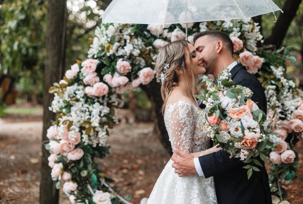 Bride tossing bouquet — small wedding venues Miami with festive energy.