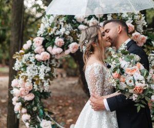 Bride tossing bouquet — small wedding venues Miami with festive energy.